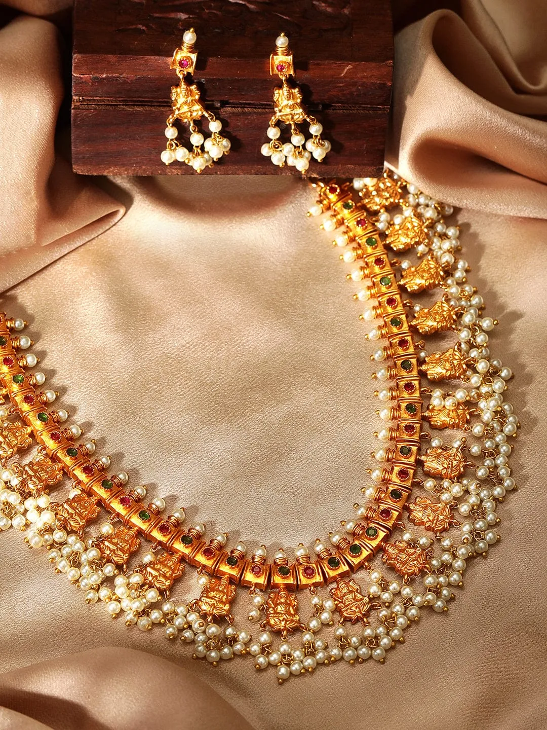 Rubans Finely Handcrafted Gold Plated Faux Ruby Studded Pearl Embellished Necklace Set